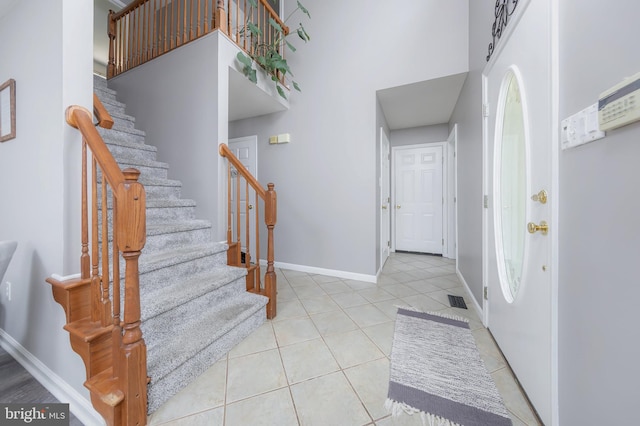185 Carriage Hill Cir, Mantua, NJ 08051 - foyer entrance with stairs, a high ceiling, tile patterned flooring, and baseboards