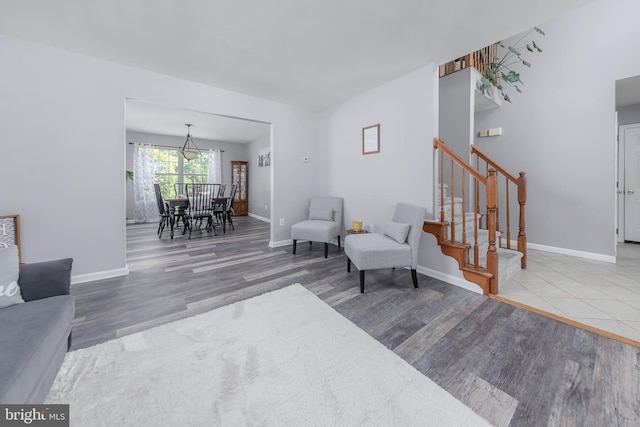 185 Carriage Hill Cir, Mantua, NJ 08051 - living area featuring wood finished floors, stairway, and baseboards
