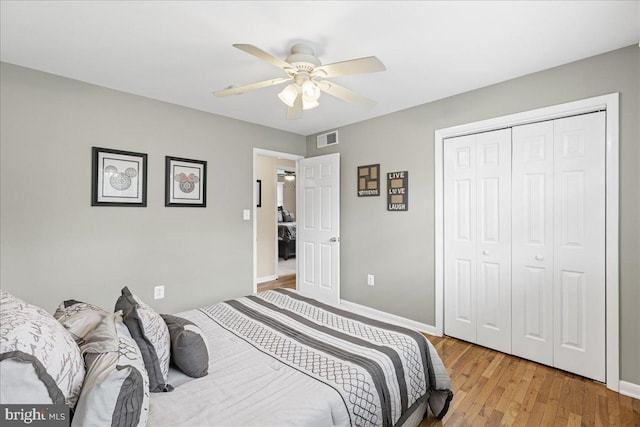 12 Woodlawn Ave, Newfield, NJ 08344 - bedroom with light wood-style flooring, a ceiling fan, and a closet
