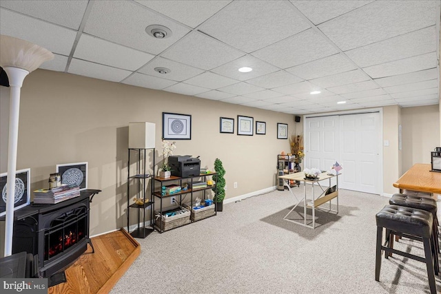 12 Woodlawn Ave, Newfield, NJ 08344 - home office featuring carpet flooring, recessed lighting, a drop ceiling, and a wood stove