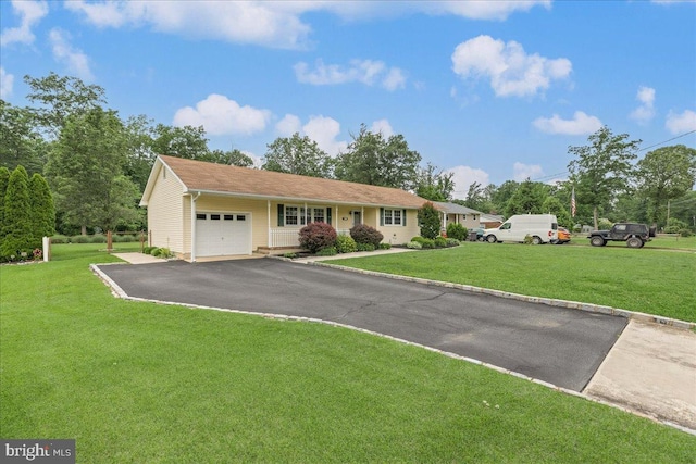 12 Woodlawn Ave, Newfield, NJ 08344 - ranch-style home with a garage, driveway, and a front lawn