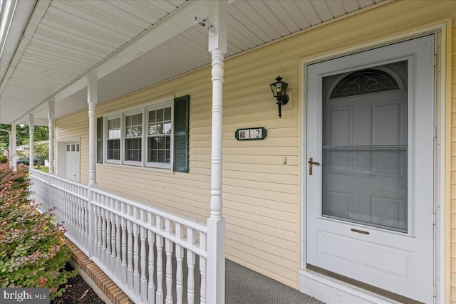 12 Woodlawn Ave, Newfield, NJ 08344 - view of exterior entry with a porch