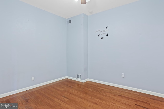 1708 Webster St, Baltimore, MD 21230 - spare room with wood finished floors and ceiling fan