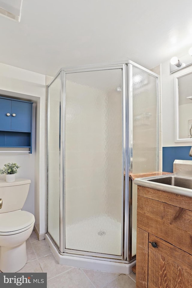 1708 Webster St, Baltimore, MD 21230 - full bathroom with tile patterned flooring, a stall shower, and vanity