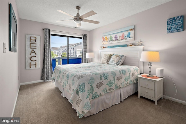 39770 E Sun Dr Unit 125, Fenwick Island, DE 19944 - carpeted bedroom featuring access to outside, a textured ceiling, and a ceiling fan