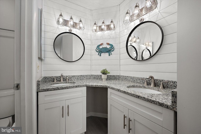 39770 E Sun Dr Unit 125, Fenwick Island, DE 19944 - bathroom featuring two vanities and toilet