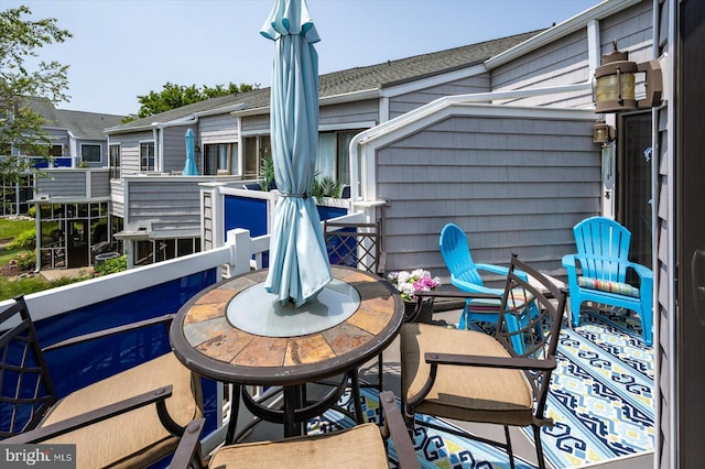 39770 E Sun Dr Unit 125, Fenwick Island, DE 19944 - view of patio featuring outdoor dining space
