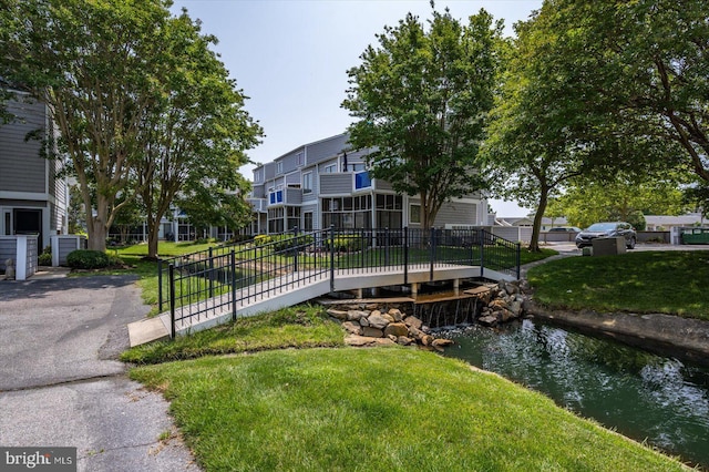 39770 E Sun Dr Unit 125, Fenwick Island, DE 19944 - view of community with a yard