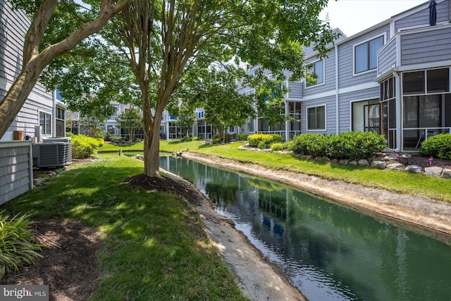39770 E Sun Dr Unit 125, Fenwick Island, DE 19944 - view of green lawn featuring a water view