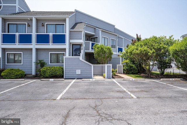 39770 E Sun Dr Unit 125, Fenwick Island, DE 19944 - view of building exterior featuring uncovered parking