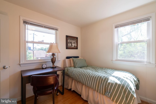 5021 23rd Rd N, Arlington, VA 22207 - bedroom with multiple windows and wood finished floors