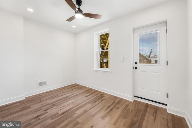 267 S Ellwood Ave, Baltimore, MD 21224 - spare room with light wood-style flooring, baseboards, a ceiling fan, and recessed lighting