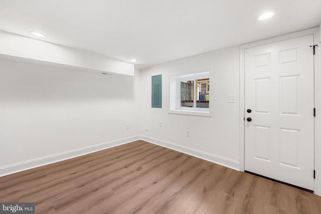 267 S Ellwood Ave, Baltimore, MD 21224 - foyer entrance featuring electric panel, wood finished floors, baseboards, and recessed lighting