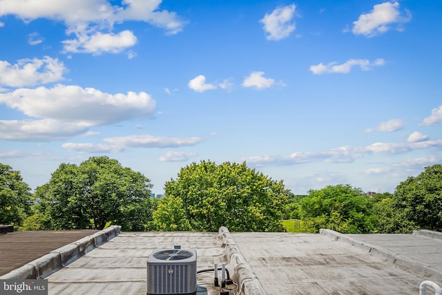 267 S Ellwood Ave, Baltimore, MD 21224 - exterior view of central AC unit and a rolled roof