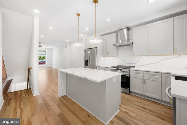 267 S Ellwood Ave, Baltimore, MD 21224 - kitchen with wall chimney exhaust hood, stainless steel appliances, a center island, backsplash, and recessed lighting