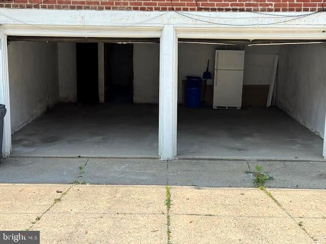 7113 Castor Ave, Philadelphia, PA 19149 - garage with freestanding refrigerator