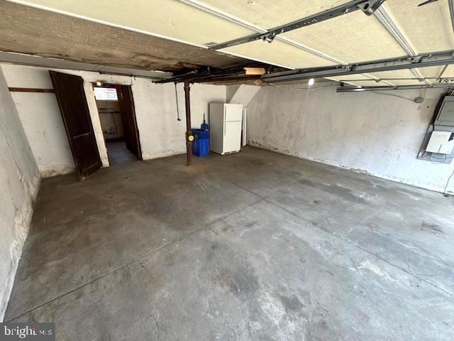 7113 Castor Ave, Philadelphia, PA 19149 - garage featuring freestanding refrigerator