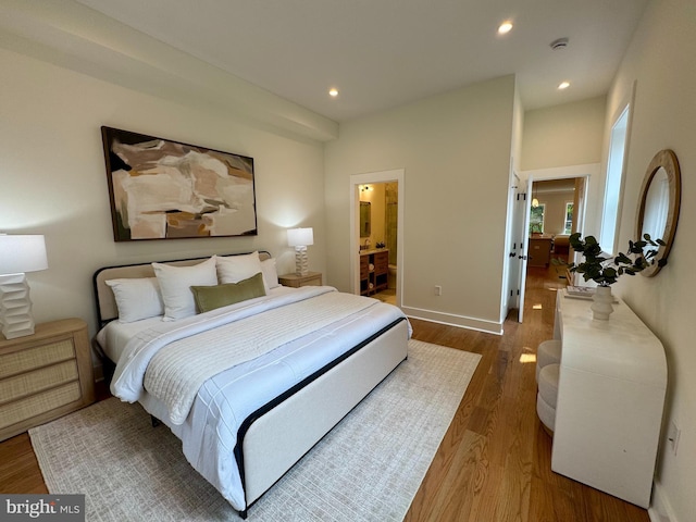309 M St NW Unit Townhome B, Washington, DC 20001 - bedroom featuring dark wood-style floors, recessed lighting, and baseboards