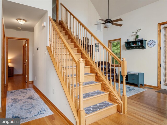 218 Nelson Way, Basye, VA 22810 - stairs featuring wood finished floors, ceiling fan, and baseboards