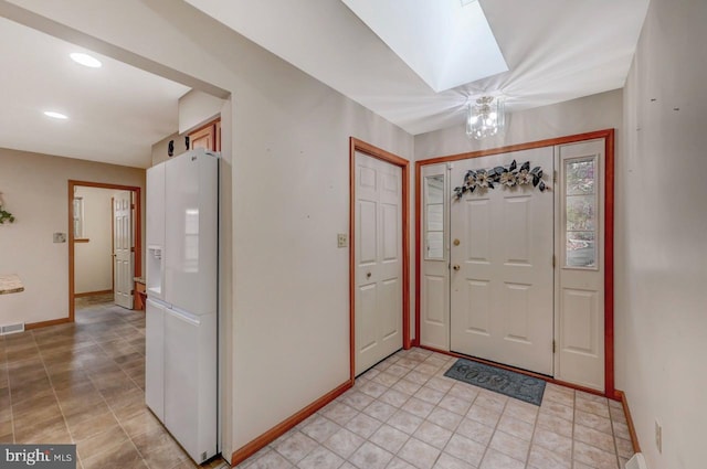 3115 Sparrow Ct, East Stroudsburg, PA 18302 - entrance foyer featuring baseboards, a skylight, light tile patterned flooring, and recessed lighting