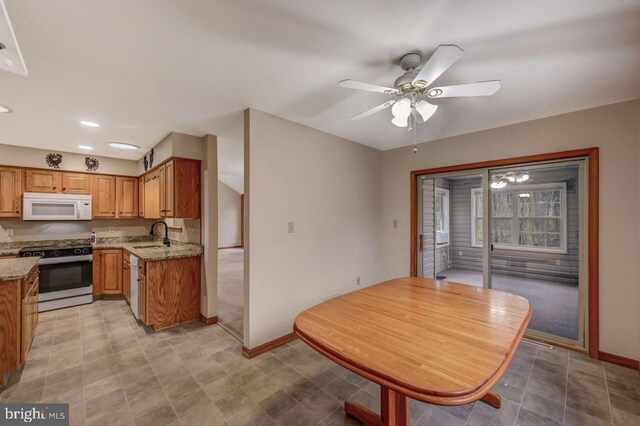 3115 Sparrow Ct, East Stroudsburg, PA 18302 - dining space featuring baseboards, a ceiling fan, and recessed lighting