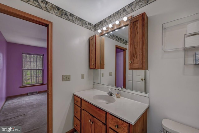 3115 Sparrow Ct, East Stroudsburg, PA 18302 - half bath featuring vanity, toilet, and baseboards