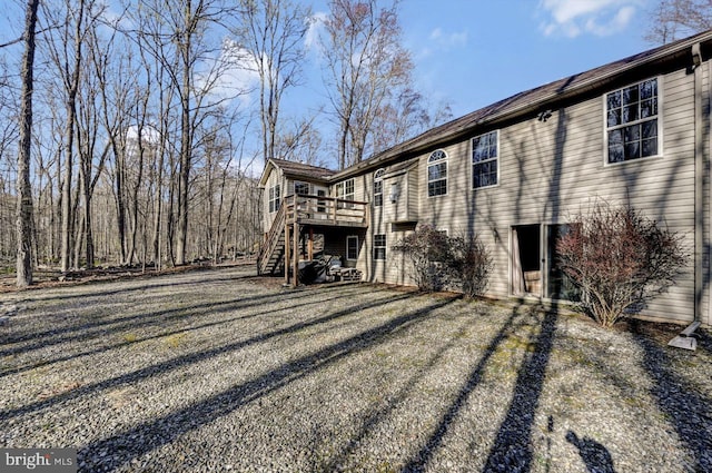 3115 Sparrow Ct, East Stroudsburg, PA 18302 - view of property exterior featuring stairway and a wooden deck