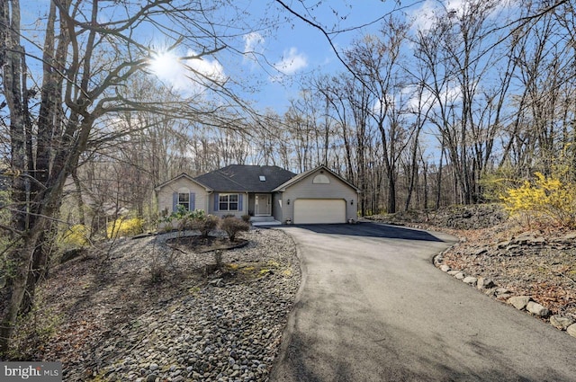 3115 Sparrow Ct, East Stroudsburg, PA 18302 - ranch-style house with driveway and a garage