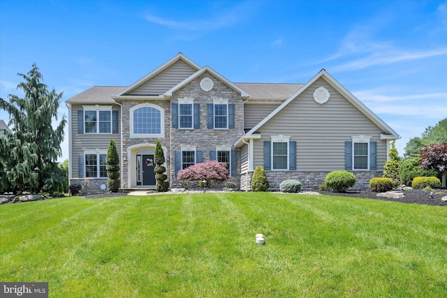 118 Connecticut Ave, Sinking Spring, PA 19608 - view of front of home with stone siding and a front lawn