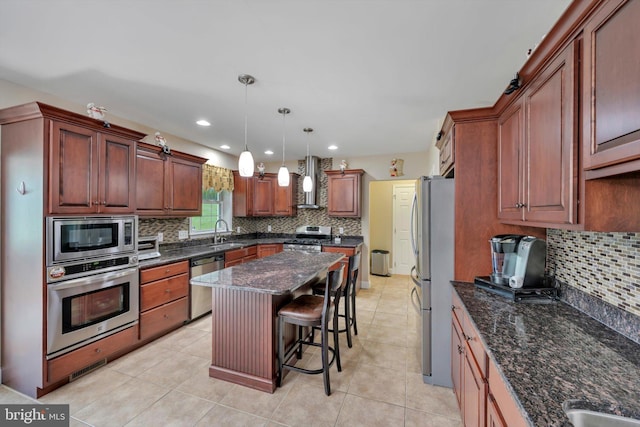 118 Connecticut Ave, Sinking Spring, PA 19608 - kitchen with appliances with stainless steel finishes, a sink, backsplash, wall chimney range hood, and recessed lighting