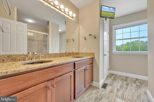 118 Connecticut Ave, Sinking Spring, PA 19608 - full bath with double vanity, a stall shower, and baseboards