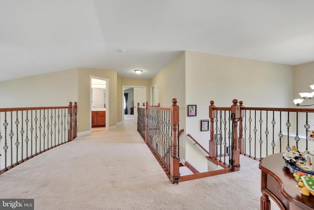 118 Connecticut Ave, Sinking Spring, PA 19608 - hall with light colored carpet, an upstairs landing, a chandelier, and baseboards