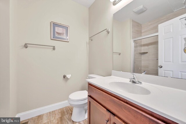 118 Connecticut Ave, Sinking Spring, PA 19608 - full bath featuring vanity, toilet, a stall shower, and baseboards