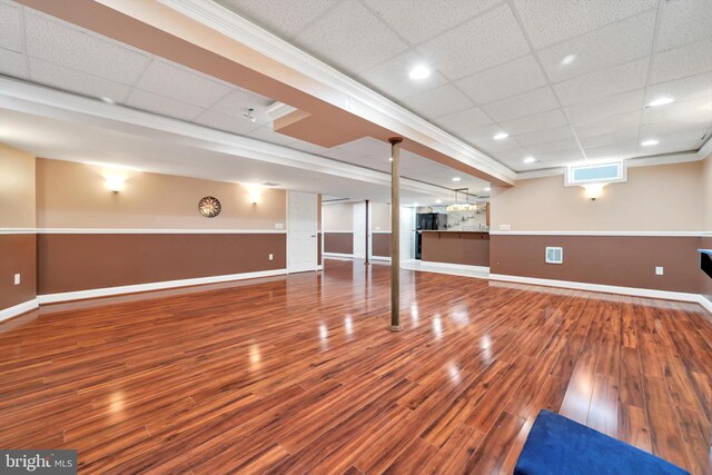 118 Connecticut Ave, Sinking Spring, PA 19608 - finished below grade area featuring wood finished floors, baseboards, a drop ceiling, and crown molding
