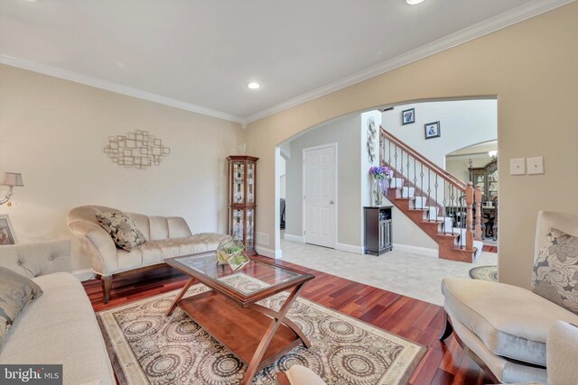 118 Connecticut Ave, Sinking Spring, PA 19608 - living room with arched walkways, wood finished floors, stairs, recessed lighting, and crown molding