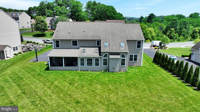 118 Connecticut Ave, Sinking Spring, PA 19608 - back of house with roof with shingles, a sunroom, and a yard