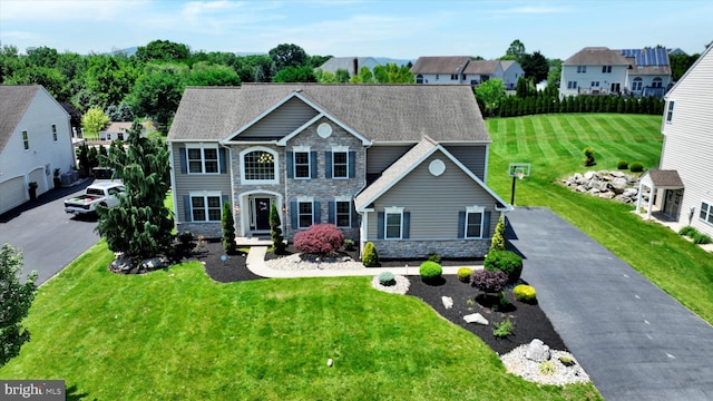 118 Connecticut Ave, Sinking Spring, PA 19608 - colonial home with stone siding and a front yard