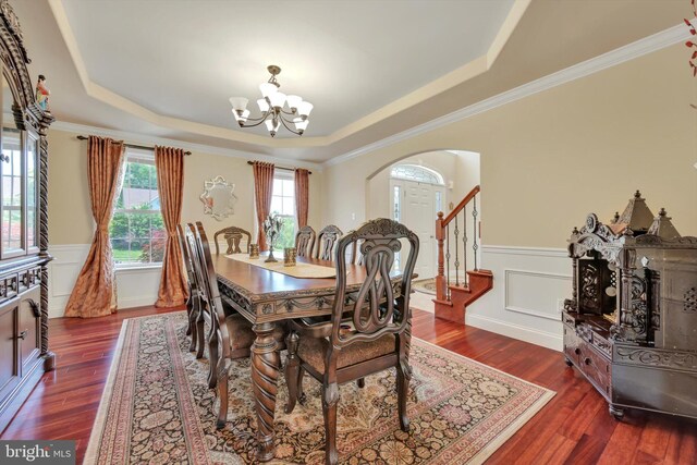 118 Connecticut Ave, Sinking Spring, PA 19608 - dining area with a raised ceiling, arched walkways, a chandelier, wainscoting, and dark wood finished floors