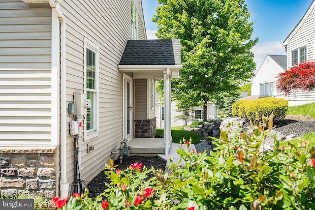 5529 Briar Ln, Whitehall, PA 18052 - property entrance with a shingled roof and stone siding