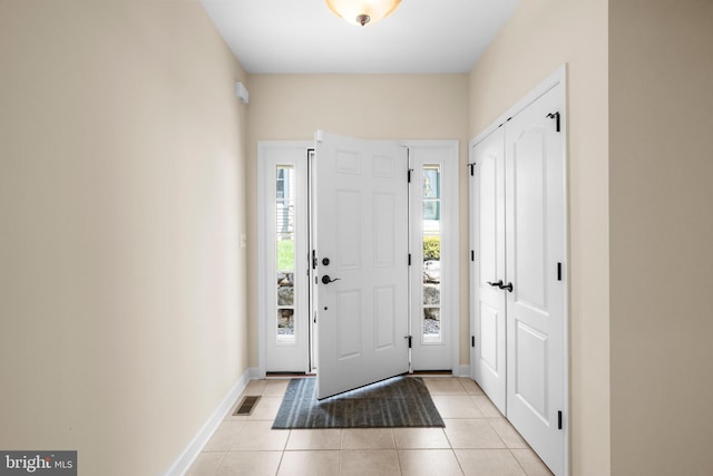 5529 Briar Ln, Whitehall, PA 18052 - foyer with light tile patterned flooring and baseboards