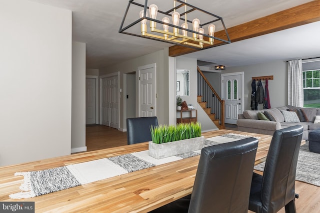 40 Grays Ln, Elverson, PA 19520 - dining area with a chandelier, stairs, and wood finished floors