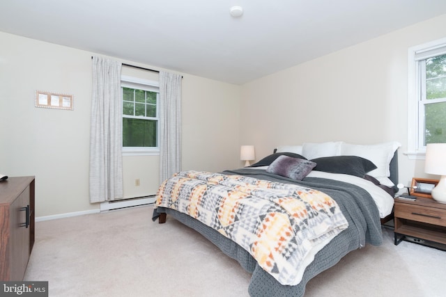 40 Grays Ln, Elverson, PA 19520 - bedroom with baseboard heating, light carpet, and baseboards