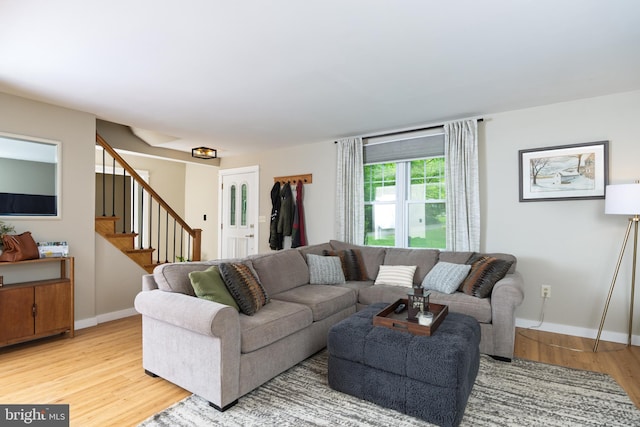 40 Grays Ln, Elverson, PA 19520 - living room with light wood-type flooring, stairs, and baseboards
