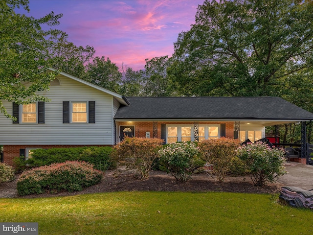 13610 Aden Rd, Nokesville, VA 20181 - tri-level home with a front lawn and brick siding