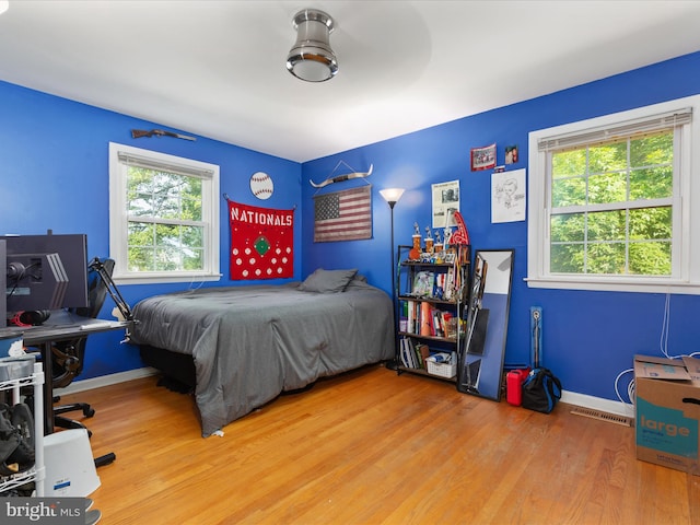 13610 Aden Rd, Nokesville, VA 20181 - bedroom with wood finished floors and baseboards