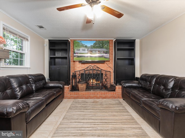 13610 Aden Rd, Nokesville, VA 20181 - living room with built in shelves, tile patterned floors, a fireplace, a ceiling fan, and a textured ceiling