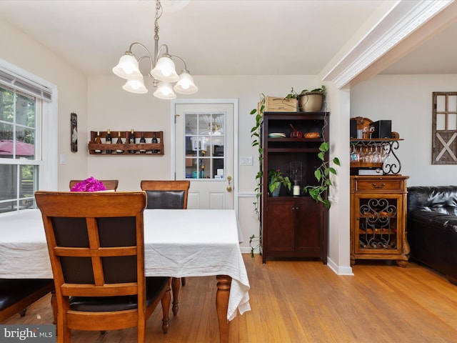 13610 Aden Rd, Nokesville, VA 20181 - dining area featuring a chandelier and wood finished floors