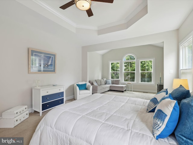 33512 Auburn Dr, Rehoboth Beach, DE 19971 - bedroom featuring light carpet, multiple windows, ornamental molding, a raised ceiling, and baseboards