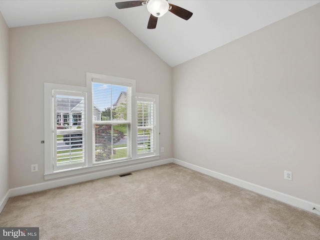 33512 Auburn Dr, Rehoboth Beach, DE 19971 - empty room featuring carpet floors, vaulted ceiling, ceiling fan, and baseboards