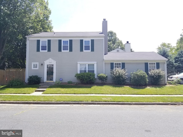 2333 Dartmouth Ln, Crofton, MD 21114 - colonial home with a chimney